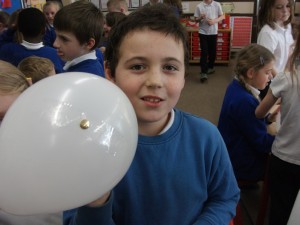 My eyes deceive me. That can't be a drawing pin stuck in a balloon? Why isn't it exploding?